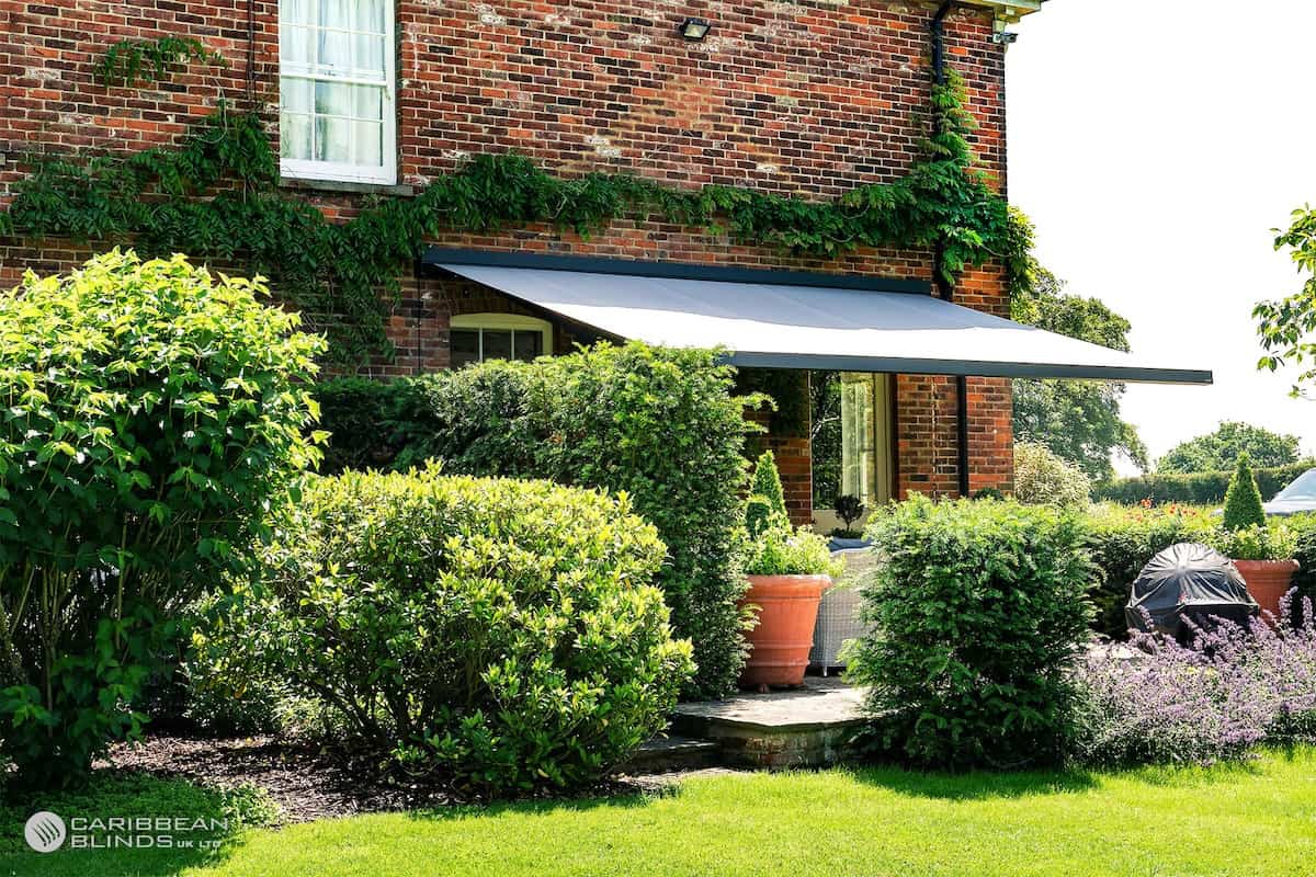 Retractable awning extended over a patio in Leighton Buzzard